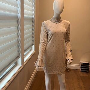 Cream dress withh open back and crystals throughout